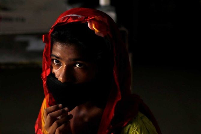 A girl waits to be tested for coronavirus in New Delhi . Photograph: Adnan Abidi/Reuters